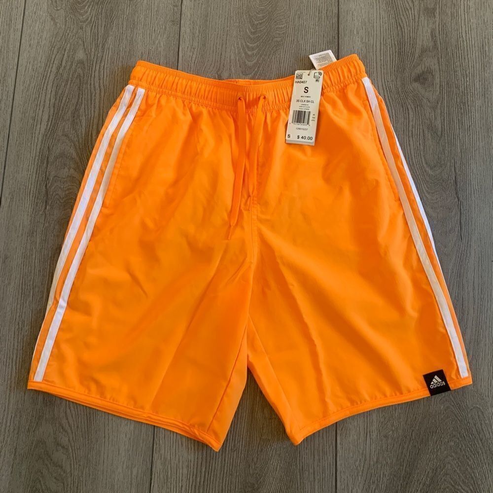 Adidas men 3Ssize S men swim shorts. Color orange/ rush white